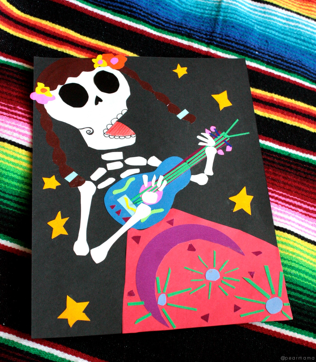 Using your favorite book for inspiration, make this calavera-inspired paper collage with your kids to celebrate the Mexican tradition of Day of the Dead.
