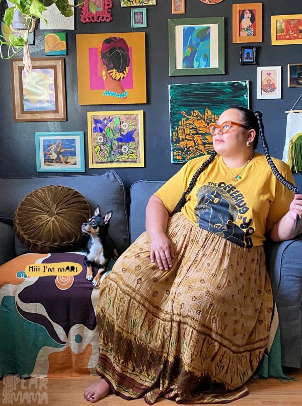 Portrait of artist Denise Silva and her dog Mars.